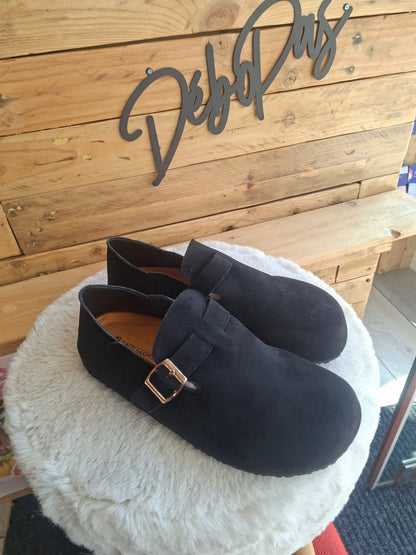 Mules noires fermées