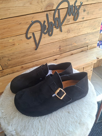 Mules noires fermées