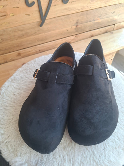 Mules noires fermées